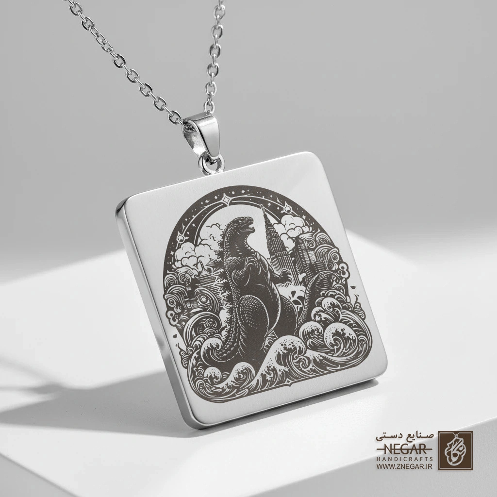 گردنبند طرح گودزیلا و نقوش ابر و باد (حکاکی لیزری فایبر، مدل قاب مربع) کد 501491
