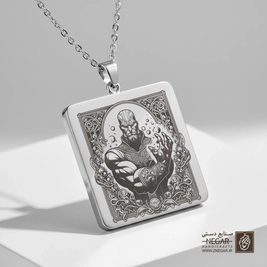 گردنبند طرح تانوس با دستکش ابدیت (Infinity Gauntlet) (حکاکی لیزری فایبر، مدل قاب مربع) کد 503511